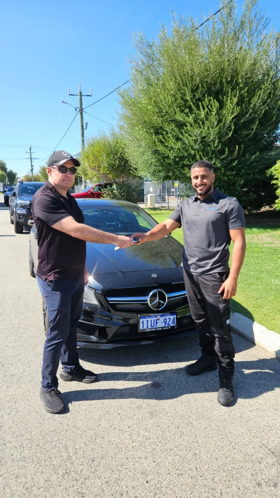 Sell My Car Pro – Car Sale with Buyer 02 Sell My Car Pro buyer finalising a car sale with a Perth customer