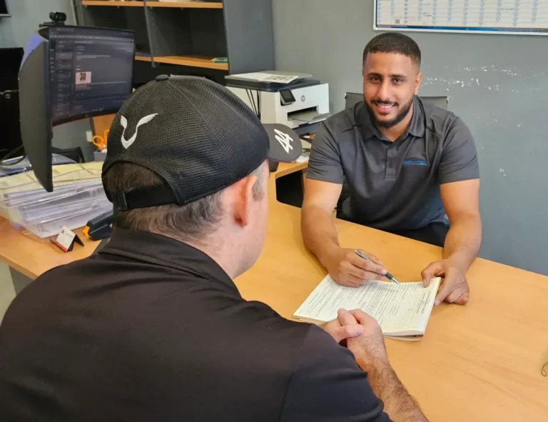 Signing the purchase agreement at Sell My Car Pro, Malaga