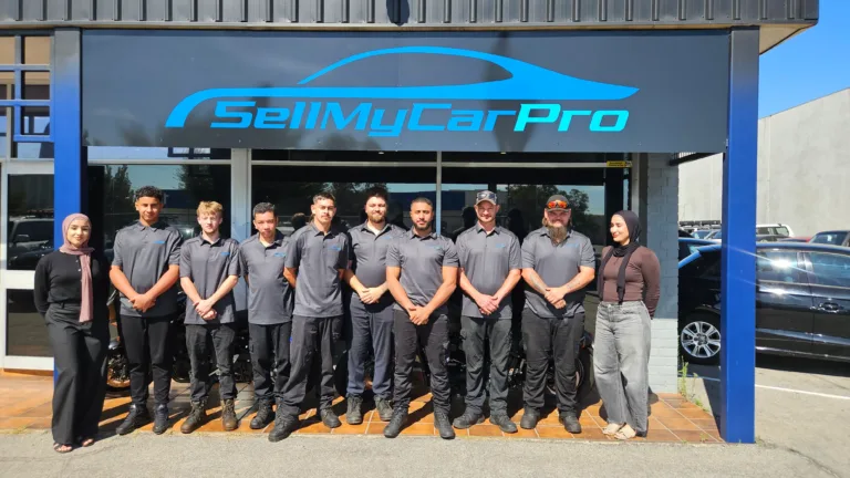 Sell My Car Pro team outside the Malaga dealership