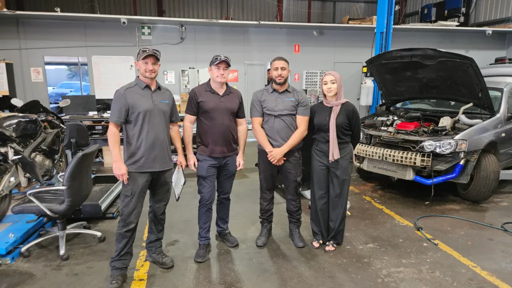Sell My Car Pro team in the Malaga workshop