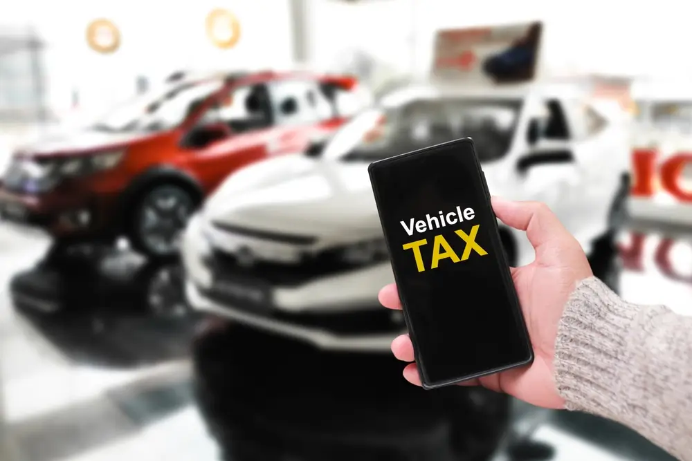 Vehicle Tax On Phone in a Dealership