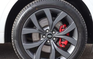 2022 Land Rover Discovery Sport P250 R-Dynamic SE alloy wheel and red brake caliper