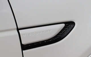 2022 Land Rover Discovery Sport P250 R-Dynamic SE side vent and Discovery badge detail